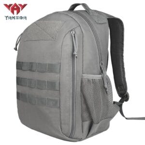 22L tactical backpack side view showing quick-access zipper compartment, mesh side pocket, and compact modular profile