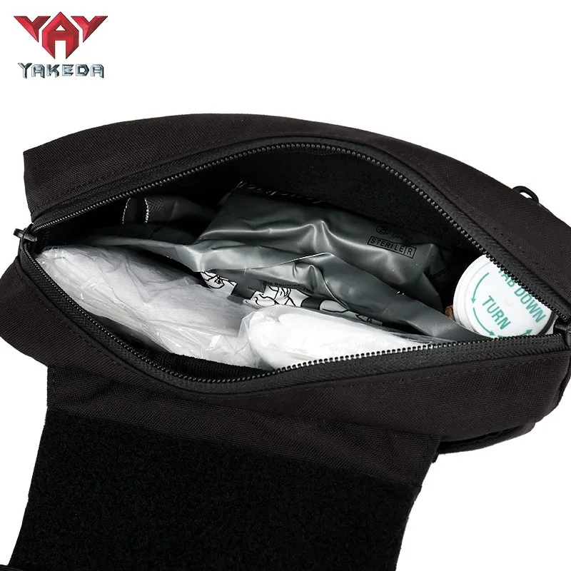 Medical utility pouch mounted on tactical chest rig vest
