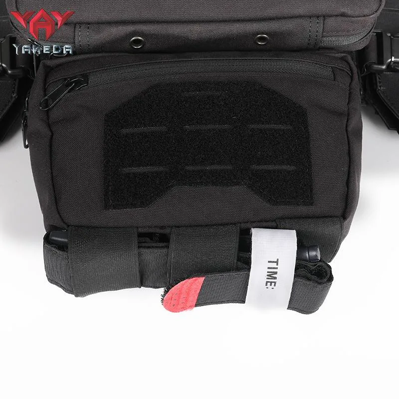 Bottom utility pouch with tourniquet holder on tactical chest rig vest