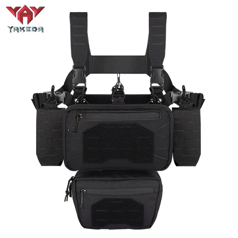 Front view of black tactical chest rig vest with modular magazine pouch system